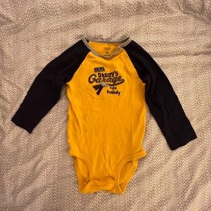 Carter’s long sleeve baby bodysuit. Size 24 months.